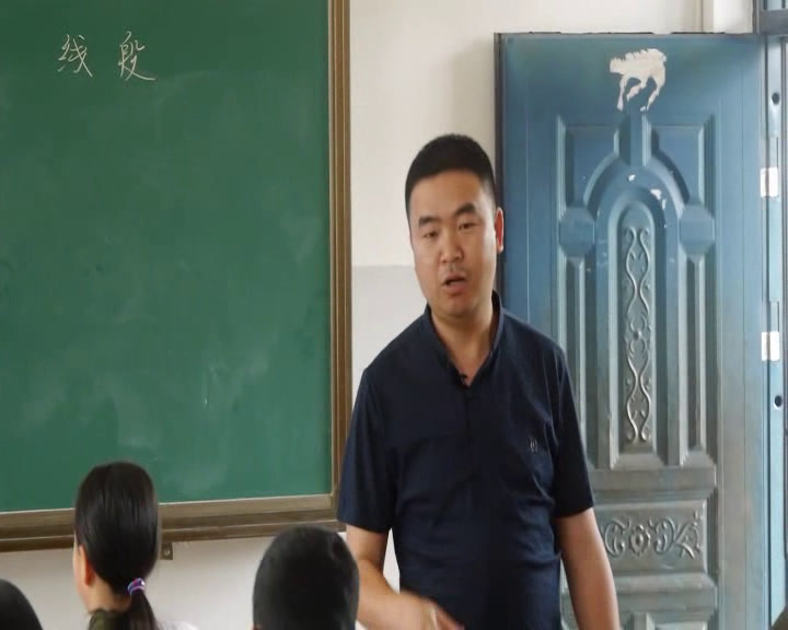 1.初中数学北师大2011版七下《线段的轴对称性》江西省省一等奖