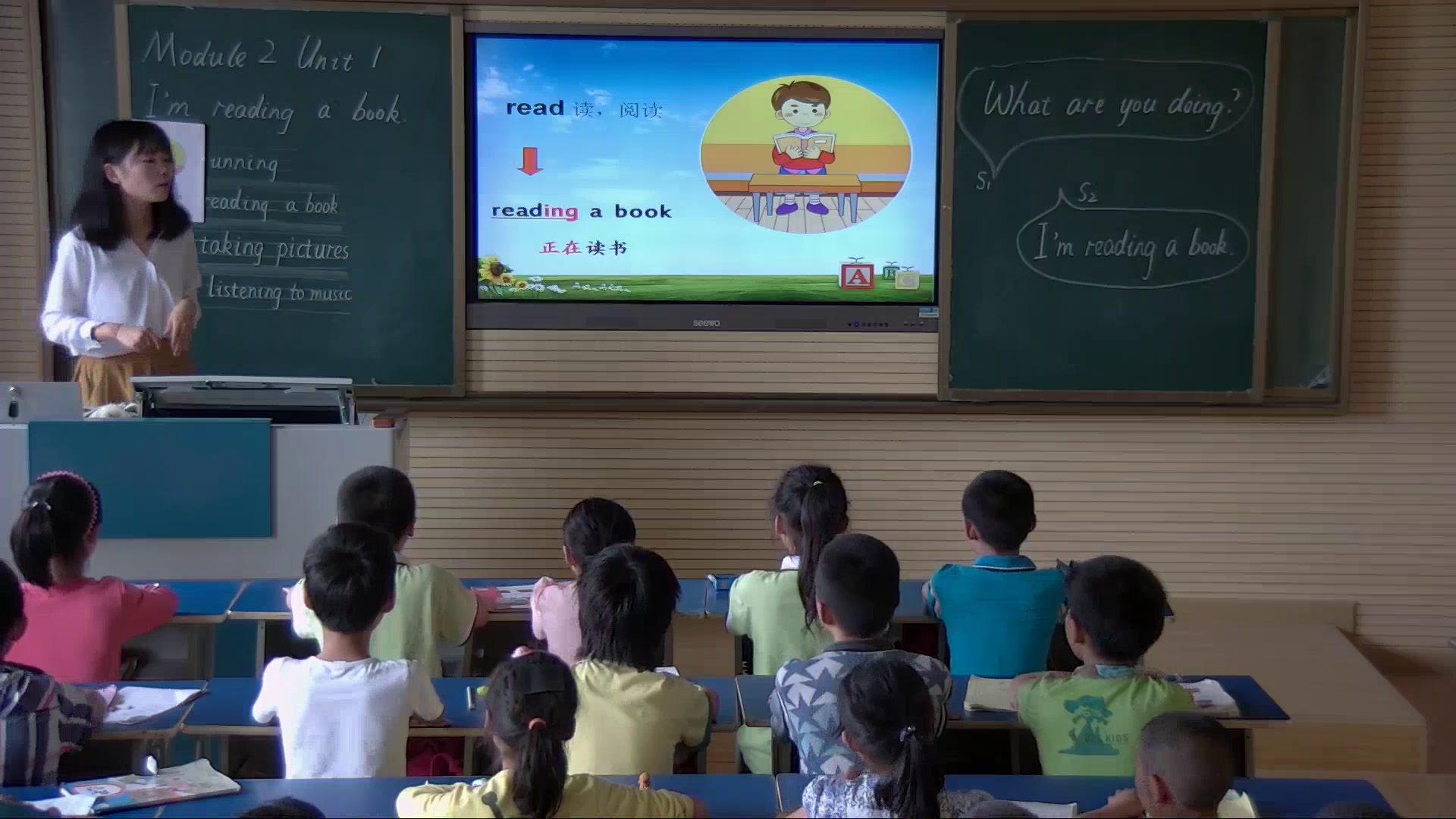 外研版英语四上《Unit1She'sreadingabook.》湖北张老师-县级优课