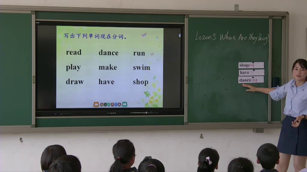 冀教版英语五下《Lesson5WhatAreTheyDoing》甘肃段老师-市一等奖