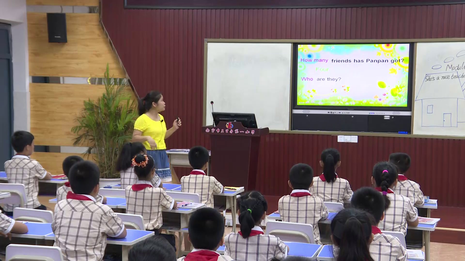 外研版英语四下《Unit1She'saniceteacher.》广西梁老师-省一等奖